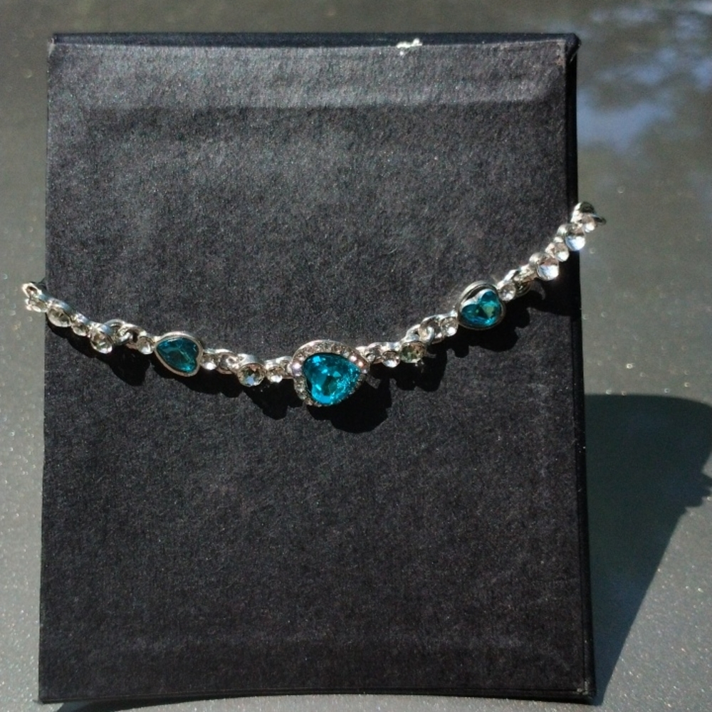 Light blue and white topaz on silver bracelet